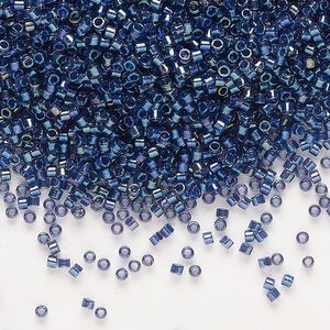 Seed bead, Delica®, glass, pkg/7.5g, #11 round, translucent night sky-lined luster crystal clear (DB-2386).