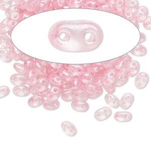 Seed bead, Preciosa Twin™ Czech glass, pkg/50g, 5x2.5mm oval, translucent pink terra pearl clear, (08198).
