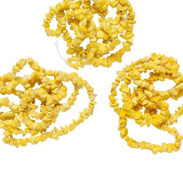 Bead, magnesite (dyed / stabilized), yellow, small to large chip with 0.4-1.4mm hole. Sold per pkg of (3) 34-inch strands. image number 0