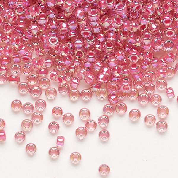 Seed bead, Miyuki, glass, pkg/250g, #8 rocaille, translucent hot pink-lined rainbow crystal clear (RR-355). image number 0