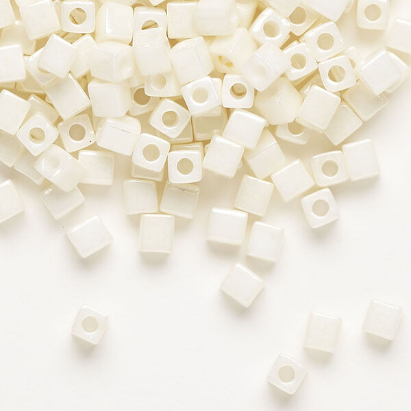 Seed bead, Miyuki, glass, pkg/25g, 3.5-3.7mm square, opaque metallic cream (SB-421). image number 0