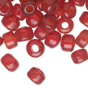 Bead, glass, transparent red, 9x7mm crow. Sold per pkg of 100.
