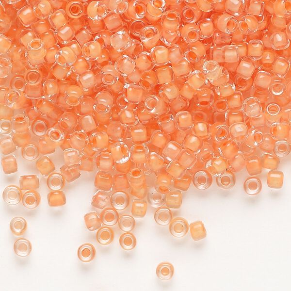 Seed bead, Dyna-Mites™, glass, translucent inside color tangerine, #8 round. Sold per 1/2 kilogram pkg. image number 0