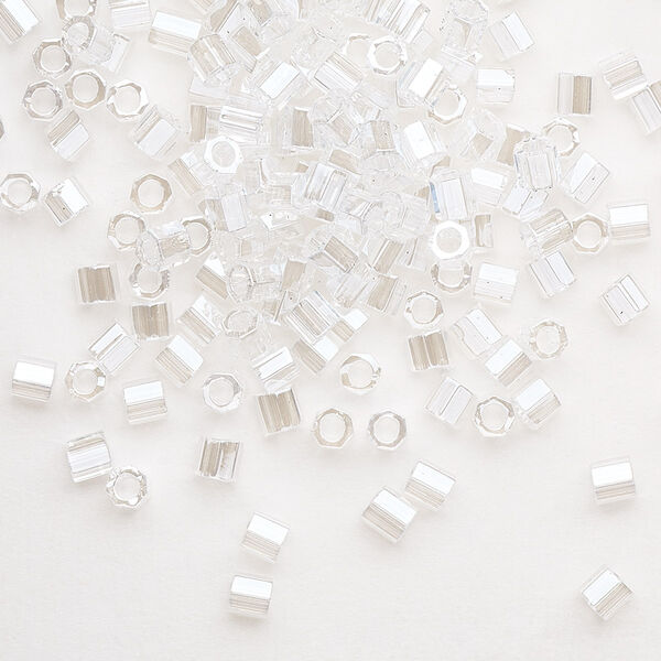 Seed bead, Delica®, glass, pkg/7.5g, #8 cut, translucent luster crystal clear (DBLC-0050). image number 0