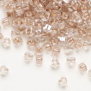 Seed bead, Miyuki, glass, transparent clear color-lined copper, (TR1129), #5 triangle. Sold per 25-gram pkg.