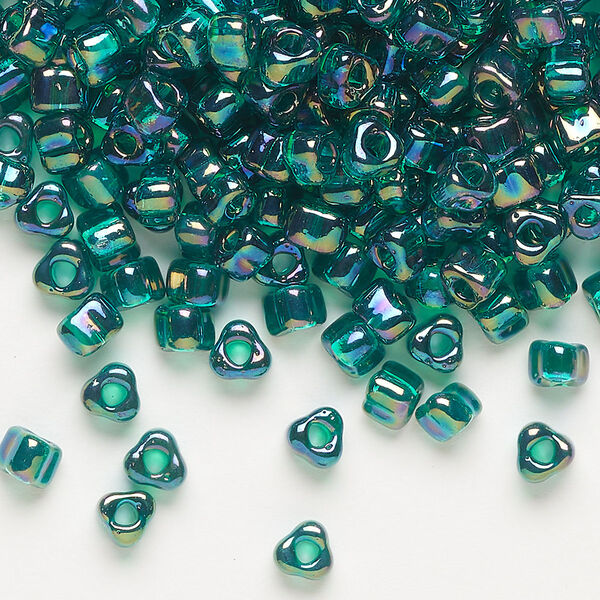 Seed bead, Miyuki, glass, transparent iris teal, (TR1159), #5 triangle. Sold per 25-gram pkg. image number 0