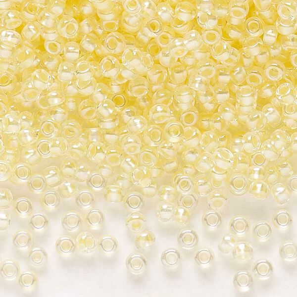 Seed bead, Preciosa Ornela Czech glass, pkg/50g, #11 rocaille, translucent color-lined luster pastel yellow, (382PY). image number 0