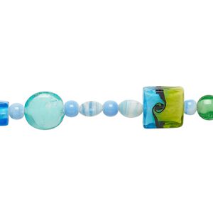 Bead mix, lampworked glass and glass, opaque to transparent multicolored, 6mm-32x29mm mixed shape. Sold per 7-inch strand.