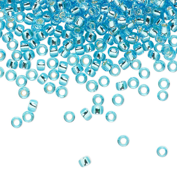 Seed bead, TOHO BEADS®, glass, pkg/50g, #8 round, transparent silver-lined aquamarine (TR-08-23). image number 0