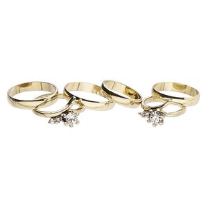 Ring mix, glass rhinestone and gold-finished brass, clear, 4mm and 12mm wide, size 5 to 12-1/2. Sold per pkg of 6.