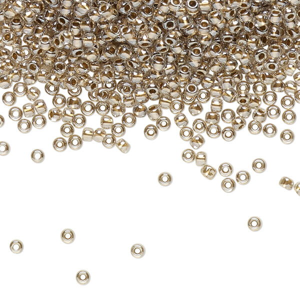 Seed bead, TOHO BEADS®, glass, pkg/250g, #11 round, transparent gold-lined crystal clear (TR-11-989). image number 0