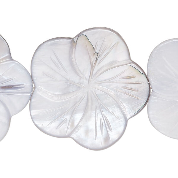 Bead, mother-of-pearl shell (dyed), pale blue, 29x28mm-31x30mm carved flat flower, 0.6-0.8mm hole, Mohs hardness 3-1/2. Sold per 15-inch strand. image number 0