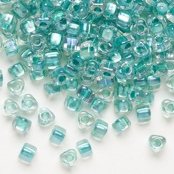 Seed bead, Miyuki, glass, transparent clear color-lined aqua, (TR1136), #5 triangle. Sold per 250-gram pkg. image number 0