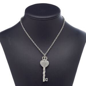 Necklace, glass rhinestone with imitation rhodium-plated steel and "pewter" (zinc-based alloy), clear, 64x21mm heart key with crown, 24 inches with lobster claw clasp. Sold individually.