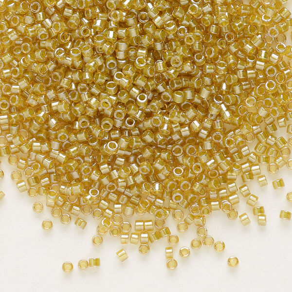 Seed bead, Delica®, glass, pkg/250g, #11 round, translucent light peridot-lined luster topaz (DB-0911). image number 0