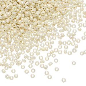 Seed bead, TOHO BEADS®, glass, pkg/50g, #11 round, opaque rainbow light beige (TR-11-409).