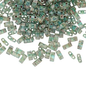 Seed bead, TILA®, glass, pkg/40g, 5x2.3mm half tila rectangle, translucent Picasso turquoise blue, (HTL-4506).