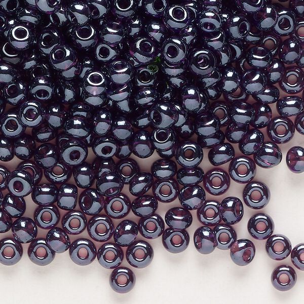 Seed bead, glass, pkg/50g, #6 rocaille, opaque luster amethyst. image number 0