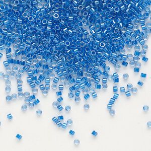 Seed bead, Delica®, glass, pkg/7.5g, #11 round, translucent cerulean blue-lined luster crystal clear (DB-0920).