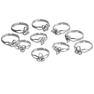 Ring mix, glass rhinestone and nickel-finished steel, clear, 6 styles, adjustable. Sold per pkg of 10.