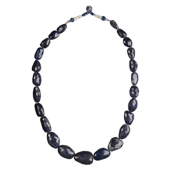 Bead, blue sapphire (dyed), dark, small to extra-large graduated hand-cut nugget, C grade, Mohs hardness 9. Sold per 21-inch strand. image number 0