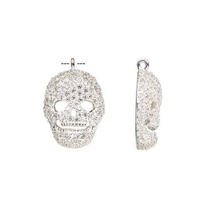 Charm, cubic zirconia and sterling silver, clear, 16x13mm skull with cutout. Sold individually.