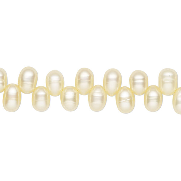 Pearl, cultured freshwater (dyed), jonquil, 6x4mm-7x5mm top-drilled rice with 0.4-0.5mm hole, D grade, Mohs hardness 2-1/2 to 4. Sold per 15-inch strand. image number 0