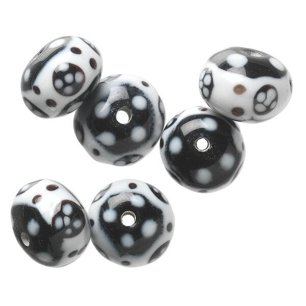 Bead, lampworked glass, opaque white and black, 15x11mm-17x12mm rondelle with flower and dot design. Sold per pkg of 6. image number 0