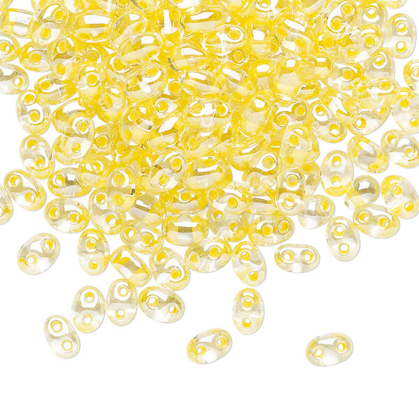 Seed bead, Preciosa Twin™ Czech glass, pkg/250g, 5x2.5mm oval, transparent yellow terra color-lined clear, (38686). image number 0
