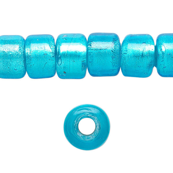 Bead, lampworked glass, semitransparent aqua blue with fine silver foil, 12x8mm crow. Sold per 15-1/2" to 16" strand. image number 0