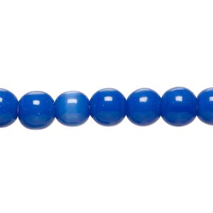 Bead, cat's eye glass (fiber optic glass), dark cobalt blue, 7-9mm round. Sold per 14-inch strand, approximately 55 beads.