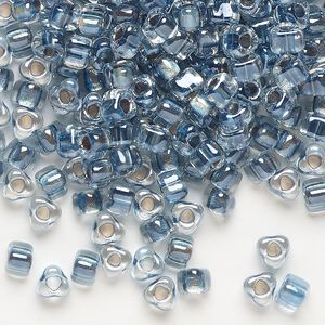 Seed bead, Miyuki, glass, transparent clear color-lined dark blue, (TR1115), #5 triangle. Sold per 250-gram pkg.