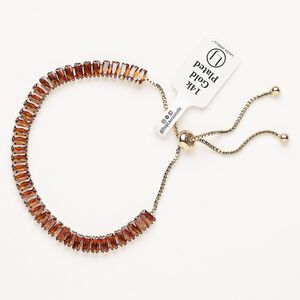 Bracelet, adjustable, brass / glass / silicone, pkg/1, 6 to 10 inches, gold plate and citrine.