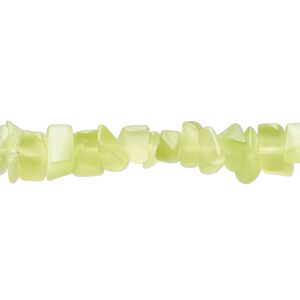 Bead, glass, translucent lime, small to large chip. Sold per 32-inch strand.