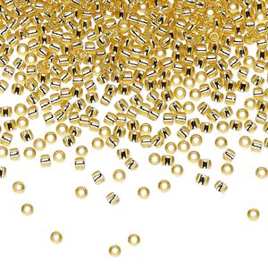 Seed bead, TOHO BEADS®, glass, pkg/250g, #11 round, transparent silver-lined light topaz (TR-11-22).