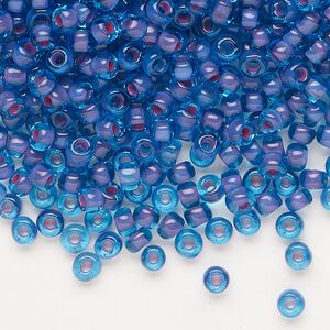 Seed bead, Dyna-Mites™, glass, translucent inside color blue lilac, #6 round. Sold per 1/2 kilogram pkg.