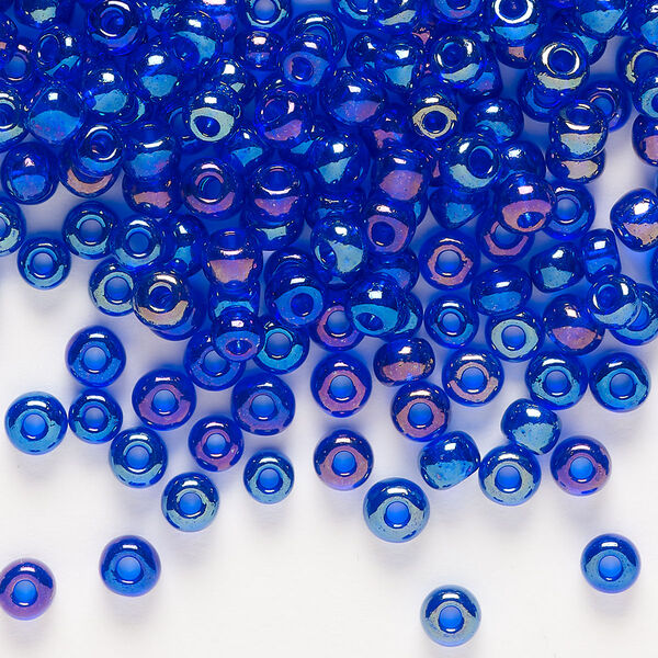 Seed bead, Preciosa Ornela Czech glass, pkg/500g, #6 rocaille, translucent rainbow blue, (31100). image number 0