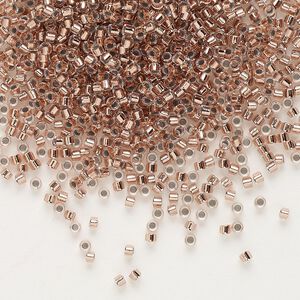 Seed bead, Delica®, glass, pkg/250g, #11 round, transparent copper-lined crystal clear (DB-0037).