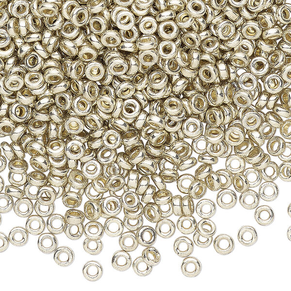 Seed bead, Miyuki, glass, pkg/10g, 3x1.3mm spacer rondelle, opaque brass-plated, (SPR3-4201). image number 0