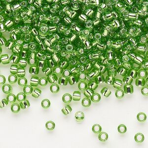 Seed bead, Dyna-Mites™, glass, silver-lined translucent green, #8 round. Sold per 1/2 kilogram pkg.