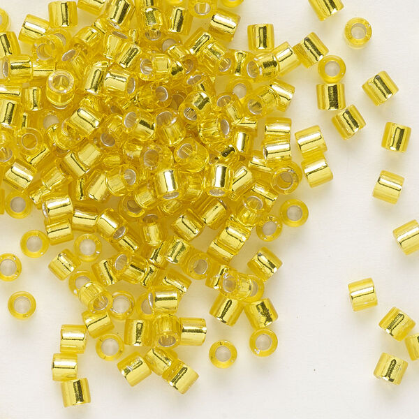 Seed bead, Delica®, glass, pkg/7.5g, #8 round, transparent silver-lined yellow (DBL-0145). image number 0