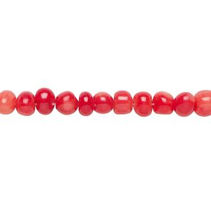 Bead, coral (dyed), red, small hand-cut pebble, Mohs hardness 3-1/2 to 4. Sold per 15-1/2" to 16" strand.