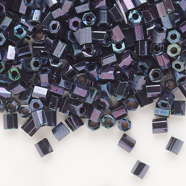 Seed bead, Dyna-Mites™, glass, opaque iris blue, #6 hex 2-cut. Sold per 1/2 kilogram pkg. image number 0