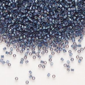 Seed bead, Delica®, glass, pkg/50g, #11 round, translucent tidal-lined luster crystal clear (DB-2387).