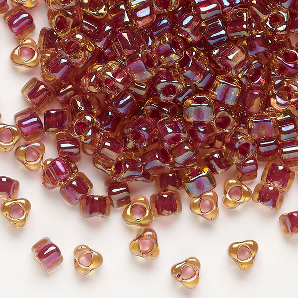 Seed bead, Miyuki, glass, transparent amber yellow color-lined rose, (TR1164), #5 triangle. Sold per 25-gram pkg. image number 0