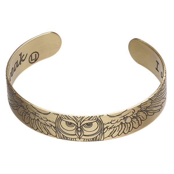 Bracelet cuff 1pkg1 antique gold-finished brass, black, 12mm wide with owl on outside / "I am strong because I've been weak" on inside. image number 0