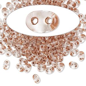 Seed bead, Preciosa Twin™ Czech glass, pkg/10g, 5x2.5mm oval, transparent copper color-lined clear, (68105).