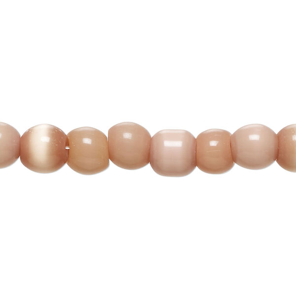 Bead, cat's eye glass (fiber optic glass), light peach, 5-8mm irregular round. Sold per 14-inch strand, approximately 60 beads. image number 0