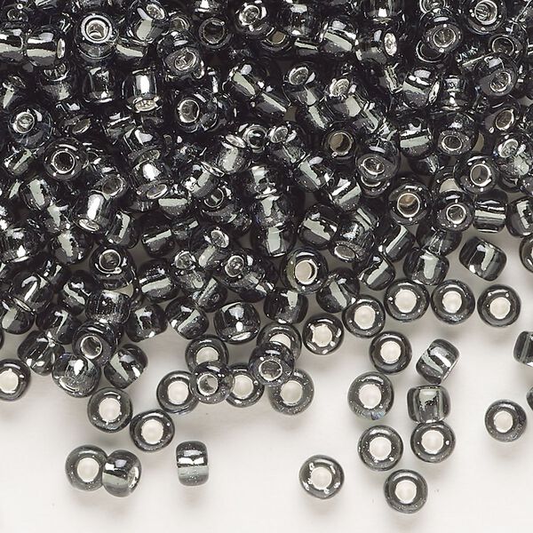 Seed bead, Dyna-Mites™, glass, transparent silver-lined gunmetal, #6 round. Sold per 1/2 kilogram pkg. image number 0