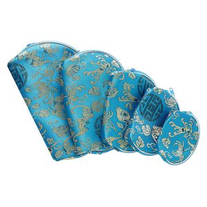 Pouch, rayon and plastic, multicolored, 4x3-inch to 8-1/2 x 5-1/2 inch graduated half round with vine and flower design with zipper closure. Sold per 5-piece set.